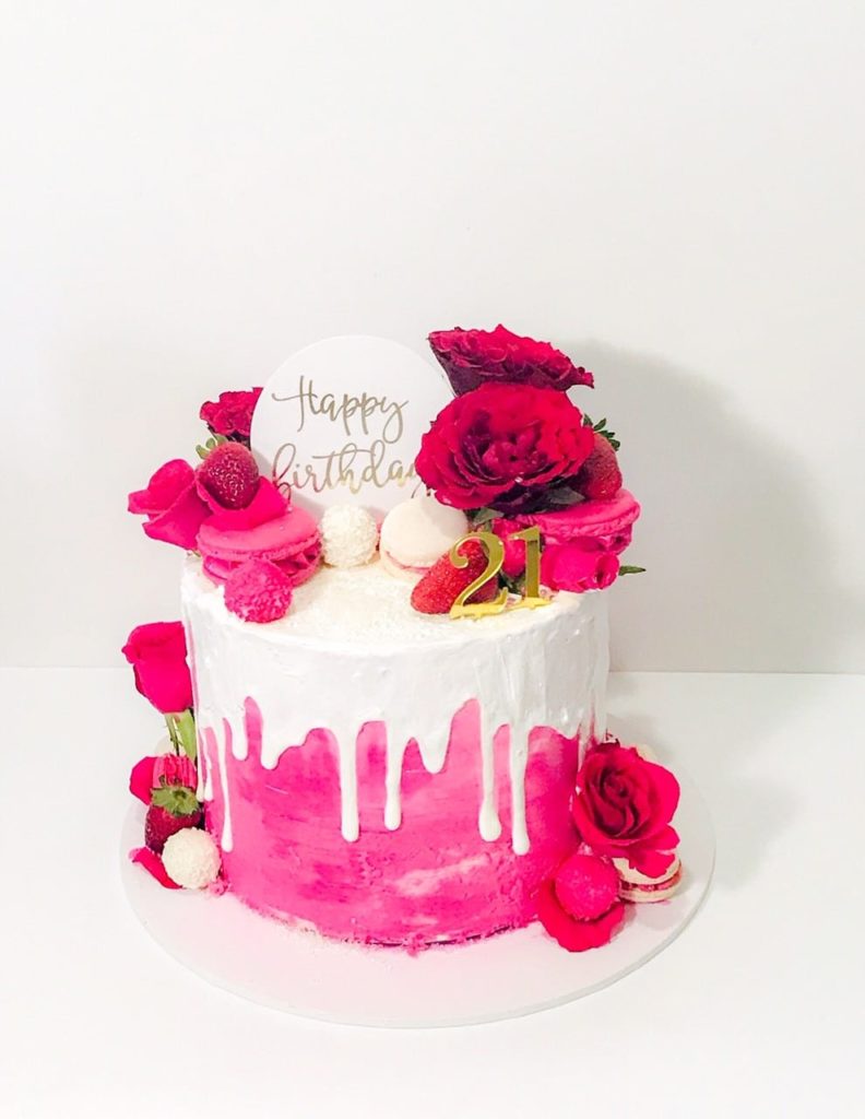 pink white drip cake flowers